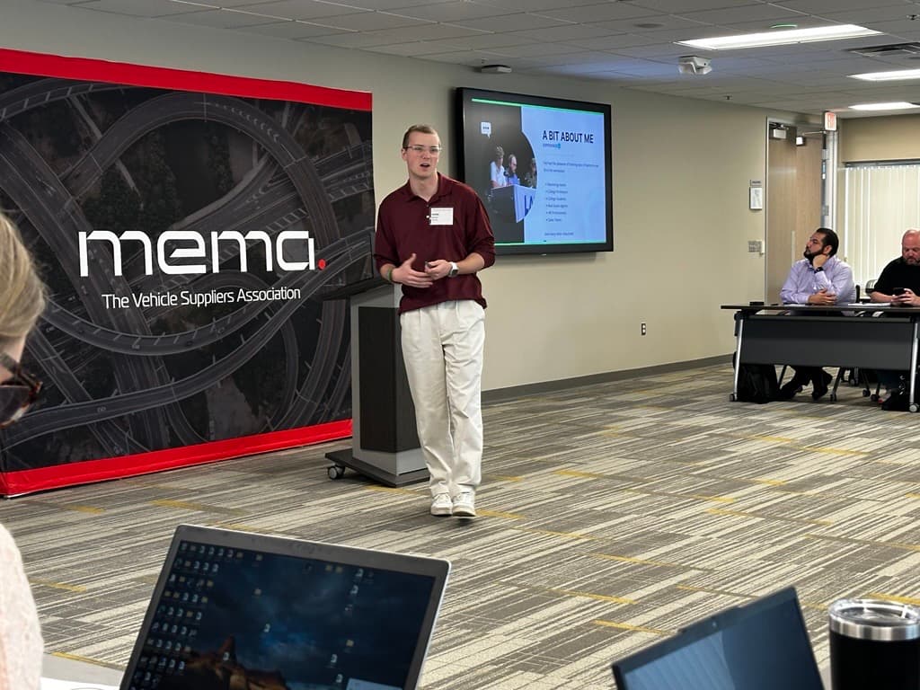 Hank speaking at a MEMA event